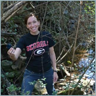 Amber Ignatius testing GPS satellite reception for stream survey
