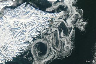 Sea ice swirls off the coast of Greenland in 2012 NASA