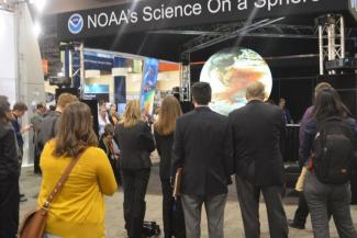 NOAA personnel interacting with attendees at 2015 American Meteorological Society Annual Meeting NOAA