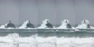 Large wave topping the Tillamook Rock lighthouse in coastal Pacific Northwest.NWS PORTLAND VIA TWITTER
