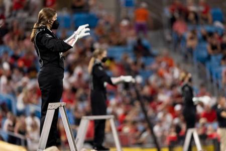 Drum majors direct the band as the Redcoat Marching Band perform. (Photo by Andrew Davis Tucker/UGA)